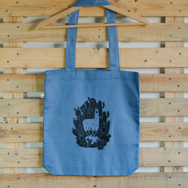 sac bleu en coton biologique imprimé en linogravure avec un lama