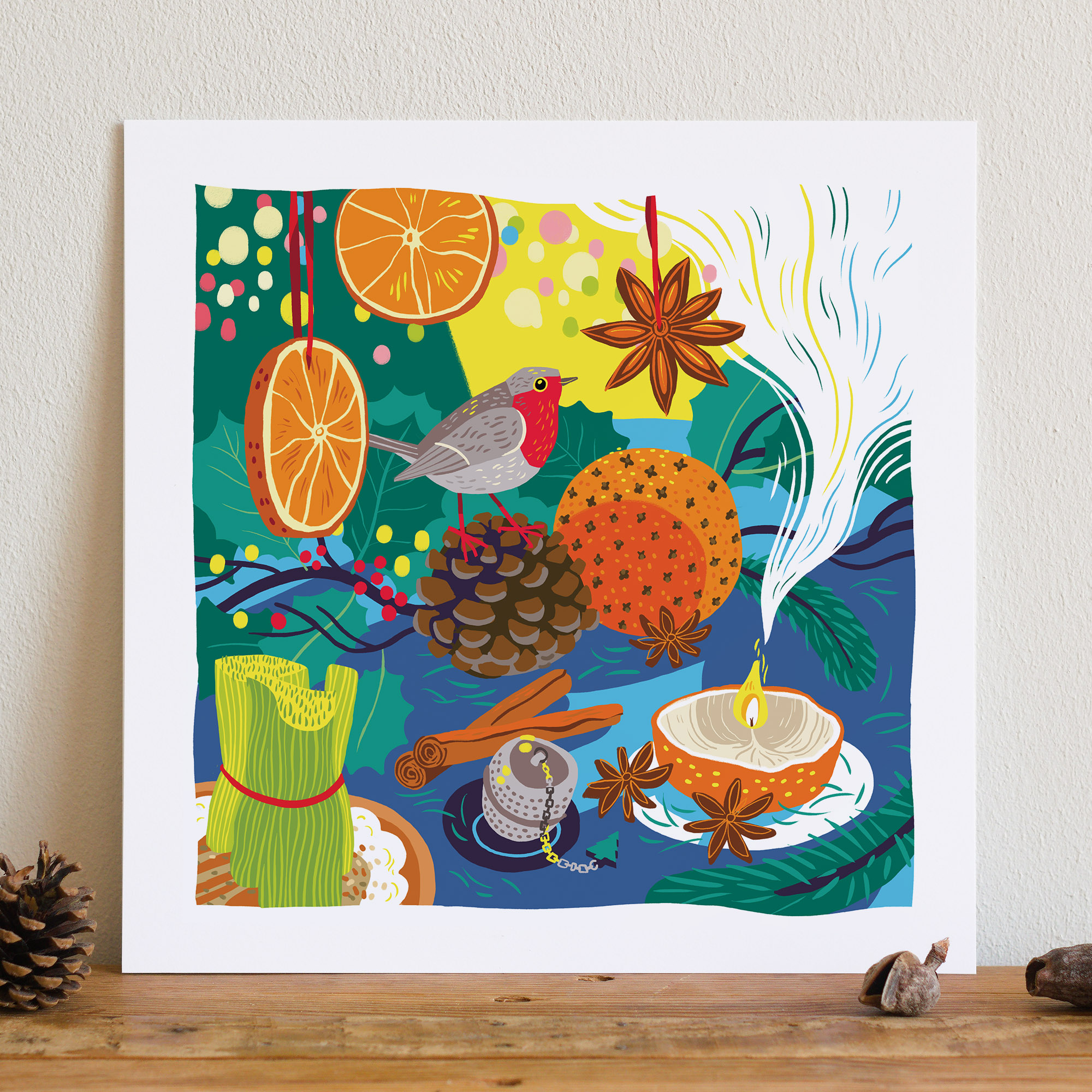 illustration de Noël représentant un rouge gorge posé sur une pomme de pin avec des oranges plantées de clous de girofle, épices, bougie et décoration de noêl